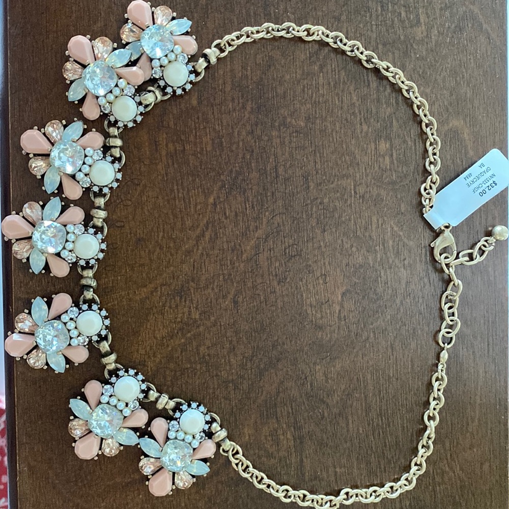 Pink and gold tone necklace